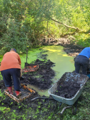 3 digging out silt by hand